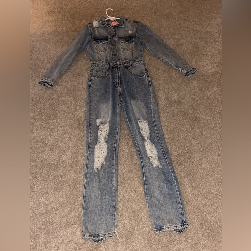 Distressed denim overalls
